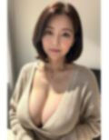 巨乳熟女のセーター姿 画像2